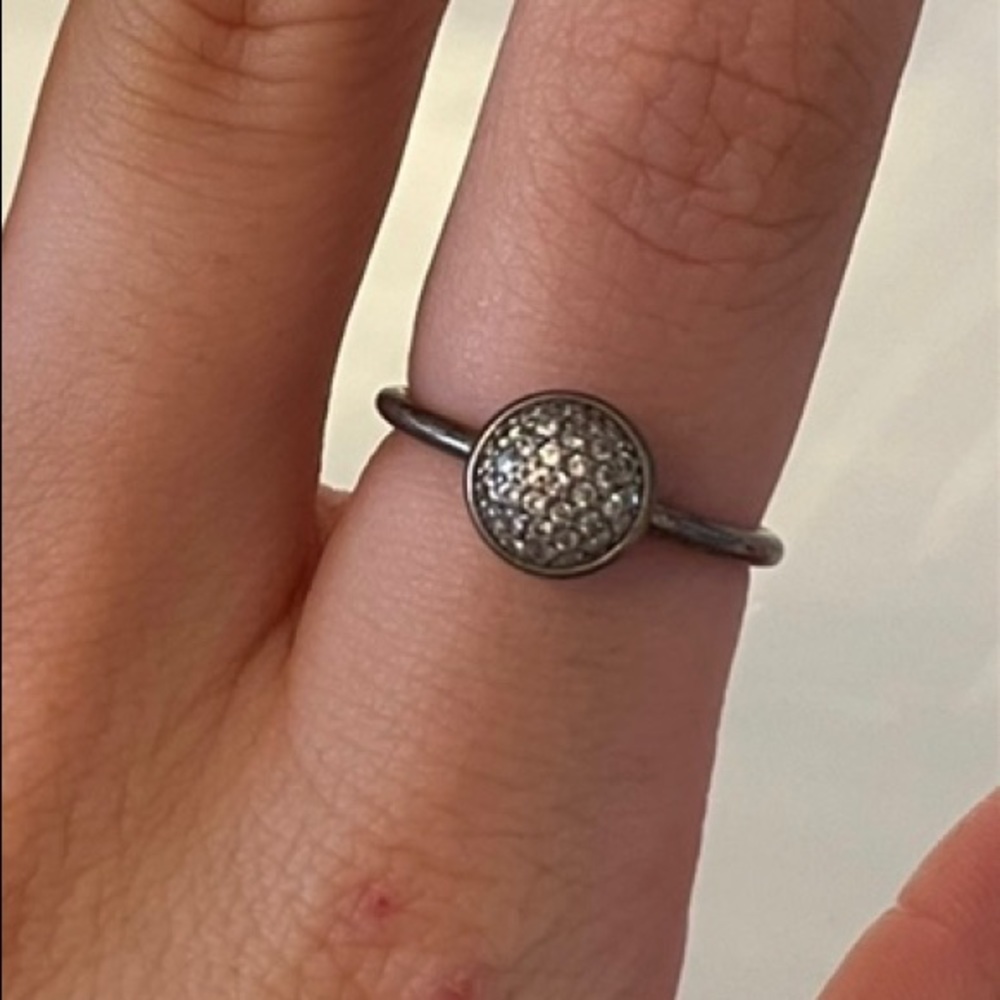 Silver ring with circular stone